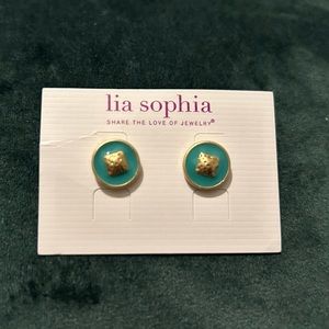 Green stud earrings with gold accents